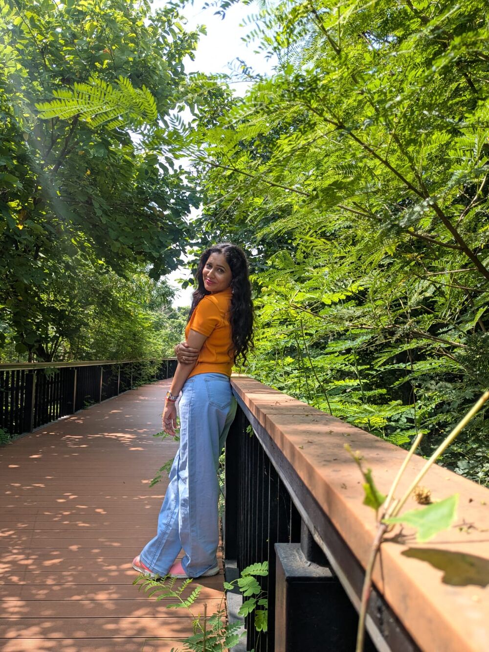 Gayatri Rampelli on a green walkway, natural-light portrait
